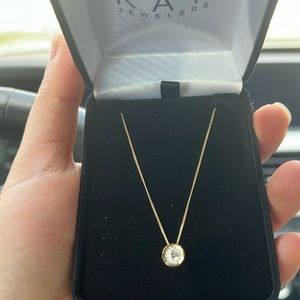 A 10k gold necklace with diamond
